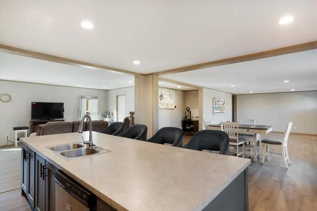 a kitchen with a table and chairs in it
