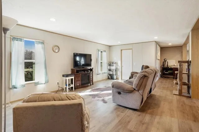 a view of kitchen and wooden floor