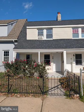 a front view of house with an outdoor space