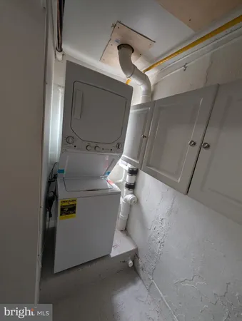 a utility room with cabinets