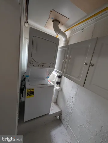 a utility room with cabinets