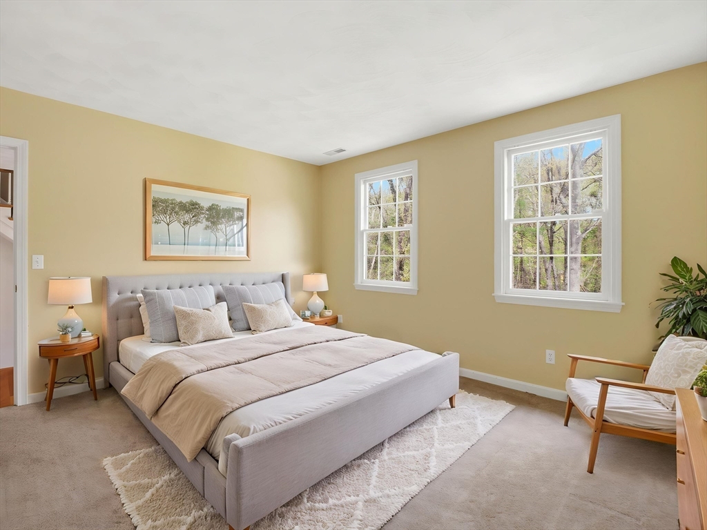 10 Hawk Ridge Road Andover, MA 01810 - Photo 17 of 32 a bedroom with a bed and a couch