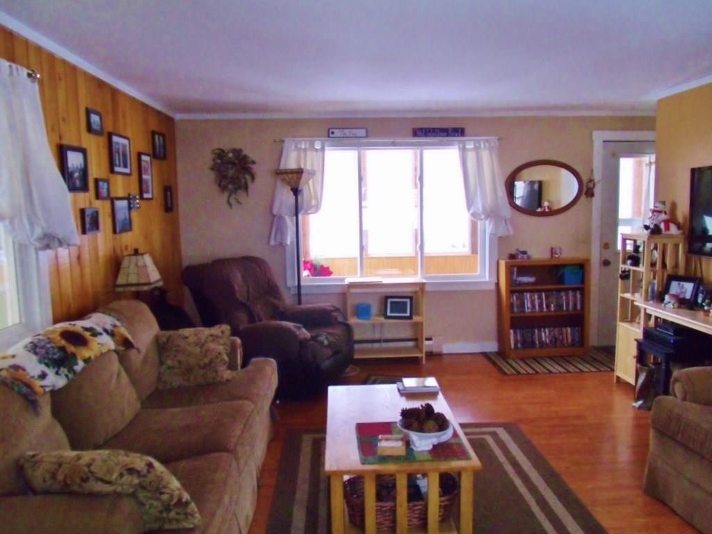 274 Red Schoolhouse Road Farmington, ME 04938 - Photo 4 of 26 Living room features easy-care...