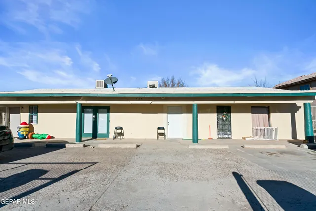 a view of swimming pool with seating area