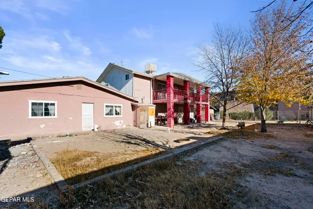 a bedroom with a bed and furniture
