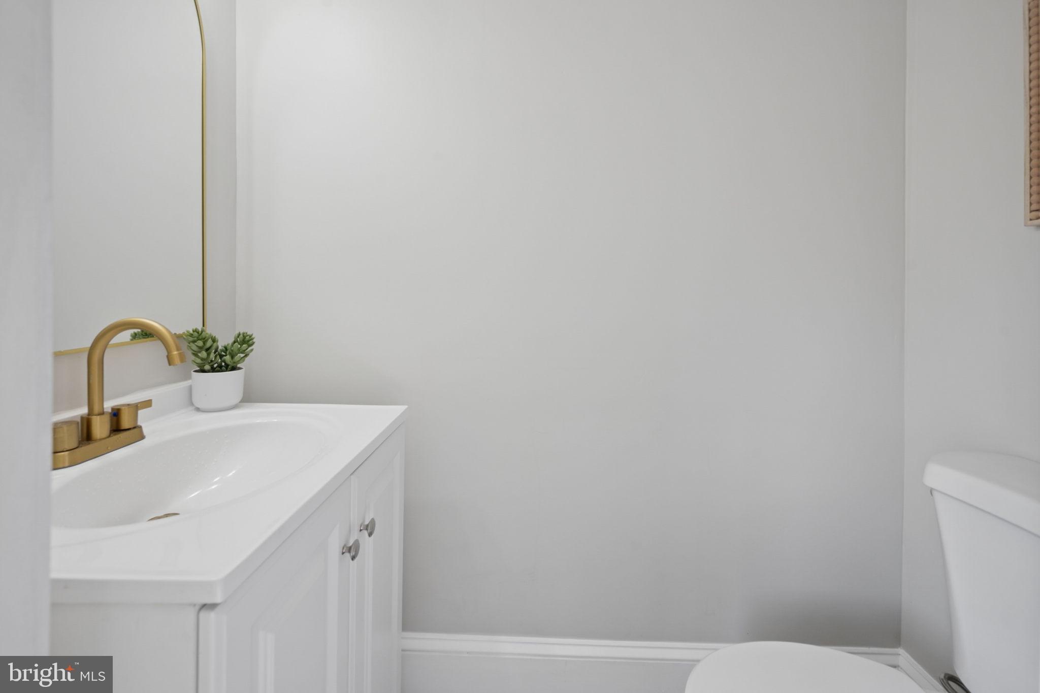 1108 South Clinton Street Baltimore, MD 21224 - Photo 19 of 66 Sleek and modern bathroom oasis.