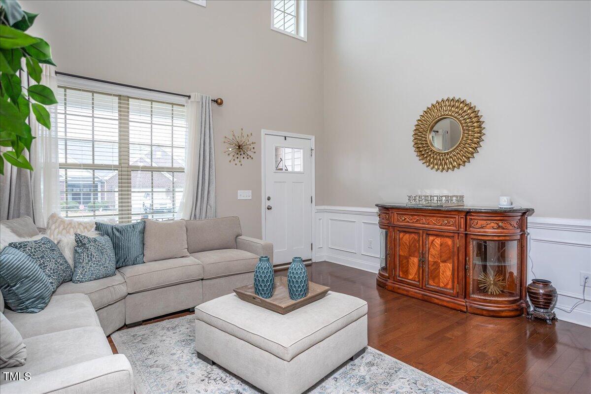 7656 Channery Way Raleigh, NC 27616 - Photo 7 of 44 Entry Foyer opens to airy Living Room