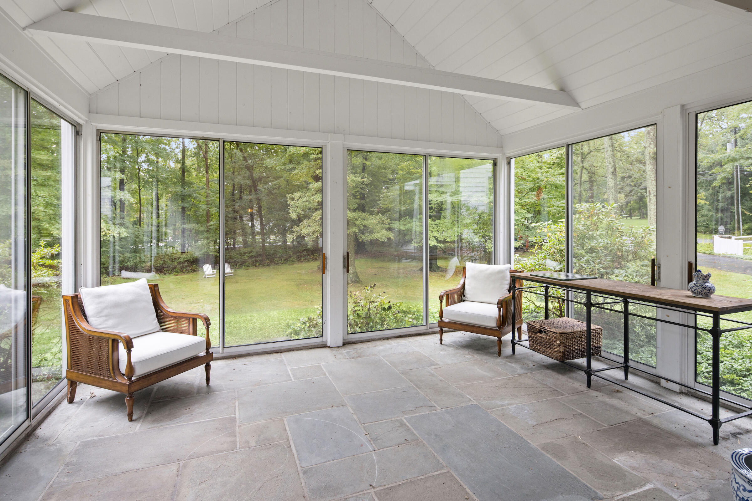 20 Maywood Road Darien, CT 06820 - Photo 25 of 27 a living room with furniture and a floor to ceiling window