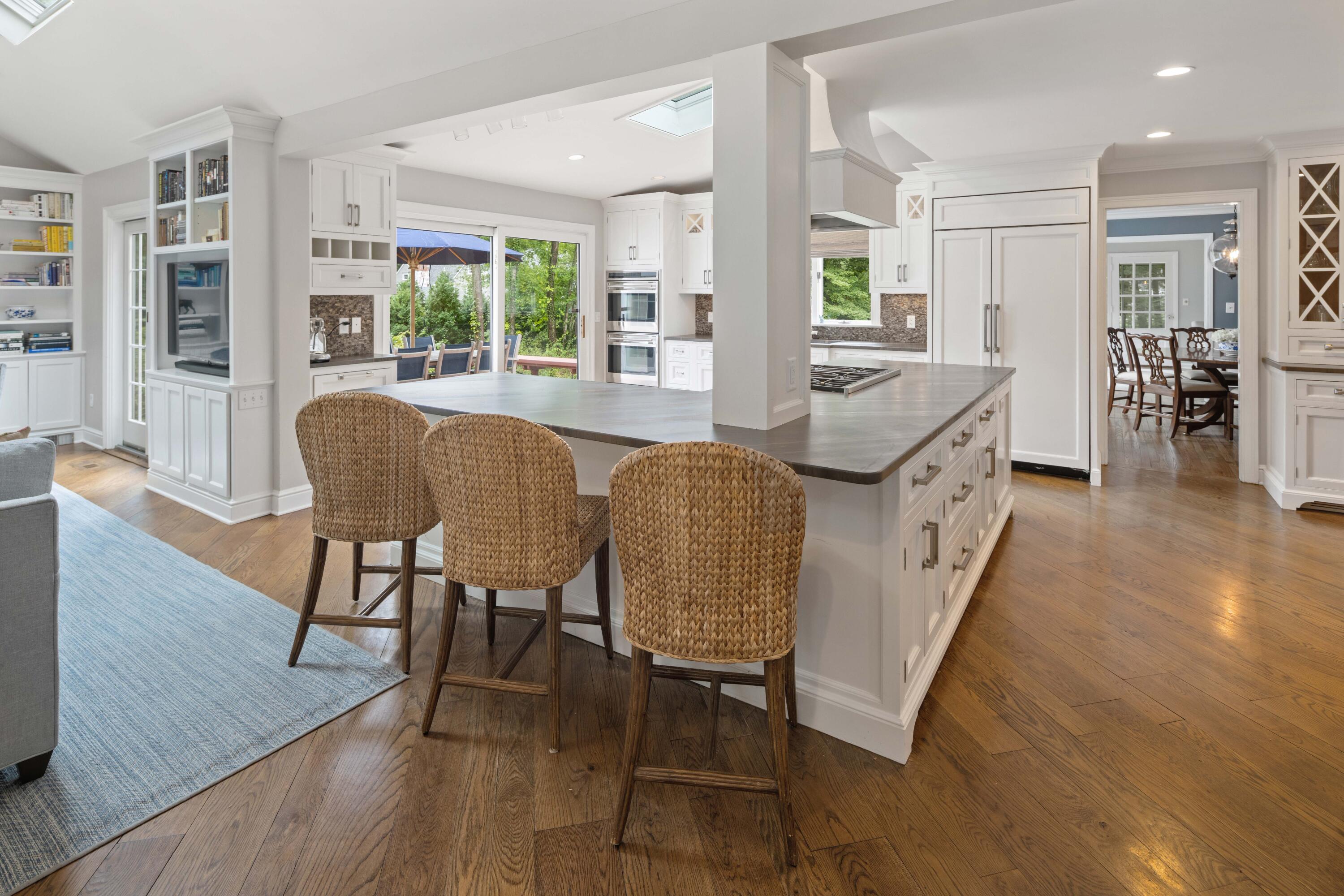 20 Maywood Road Darien, CT 06820 - Photo 4 of 27 a dining room with furniture and wooden floor