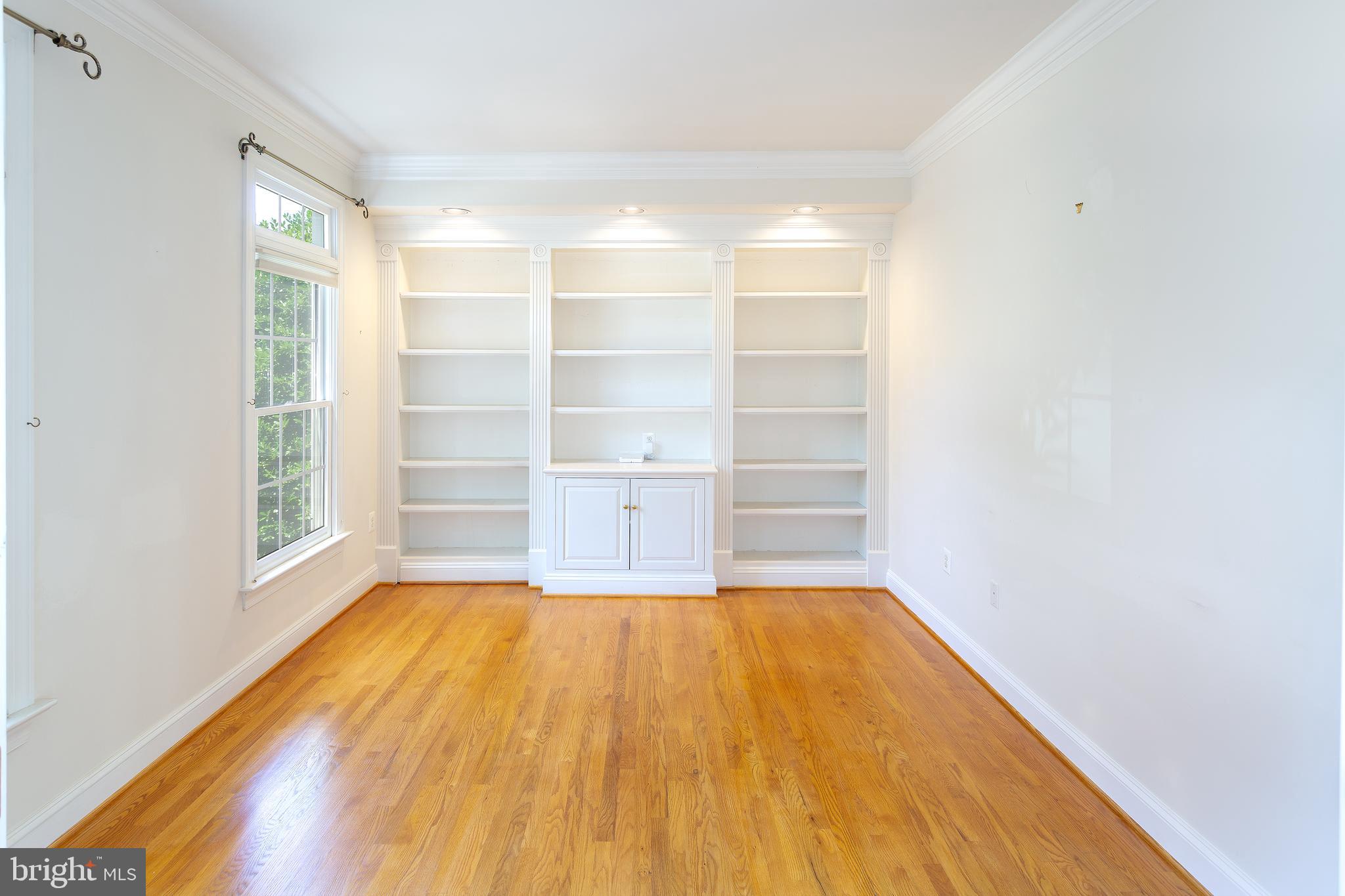 5924 Chesterbrook Road McLean, VA 22101 - Photo 11 of 60 Office with secret storage area behind bookcase