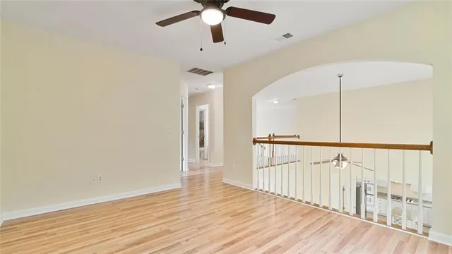 a view of a bathroom from a hallway