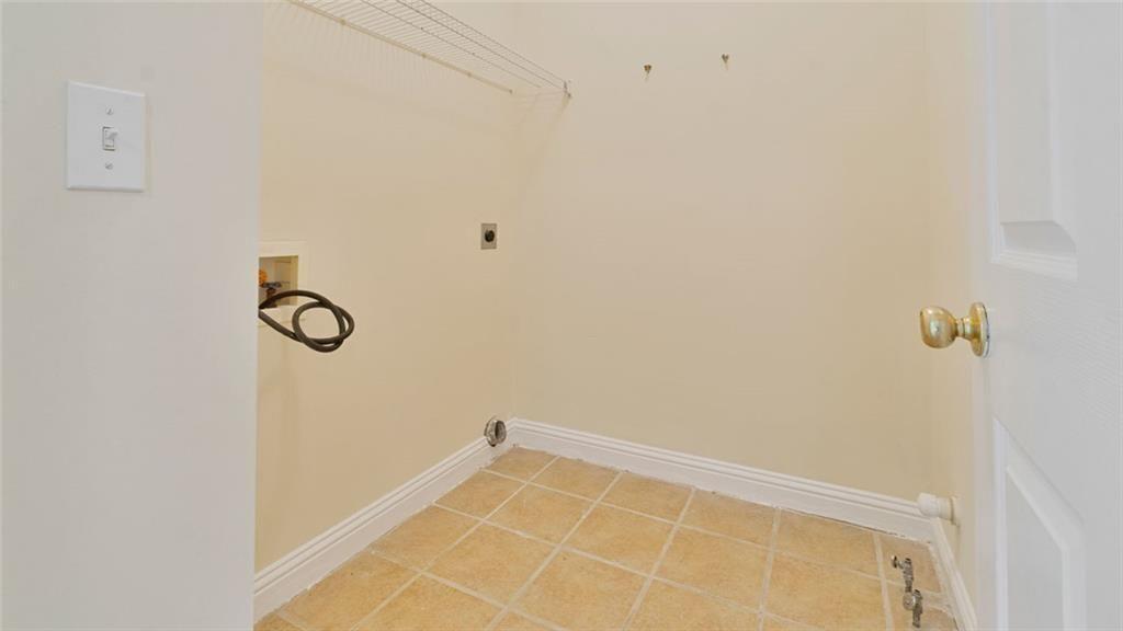 4612 Springside Court Southwest Mableton, GA 30126 - Photo 24 of 40 a view of a room with racks on the wall