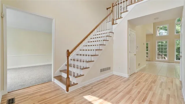 a view of entryway with wooden floor