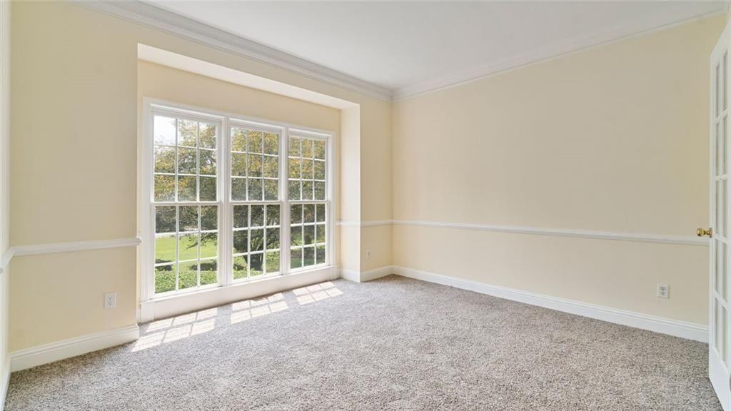 4612 Springside Court Southwest Mableton, GA 30126 - Photo 5 of 40 a view of an empty room with a window