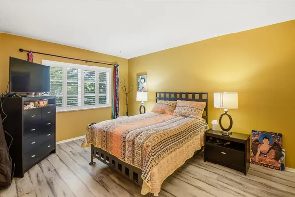 a view of a storage & utility room with two washing machine