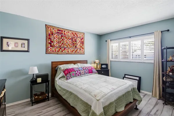 a view of a patio with a dining table and chairs