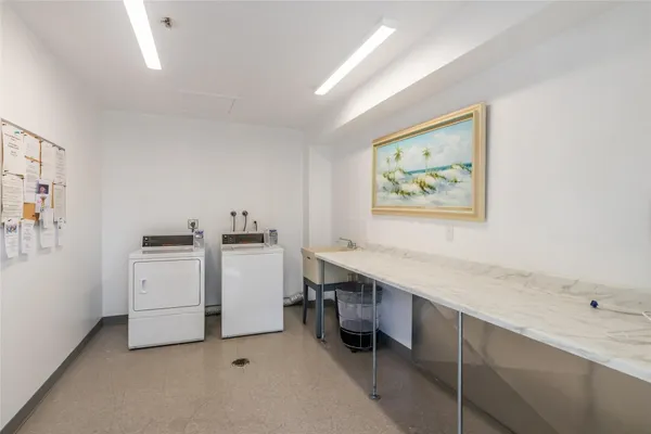 a view of a balcony with wooden floor and outdoor space