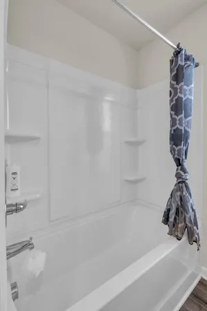 a bathroom with a bathtub