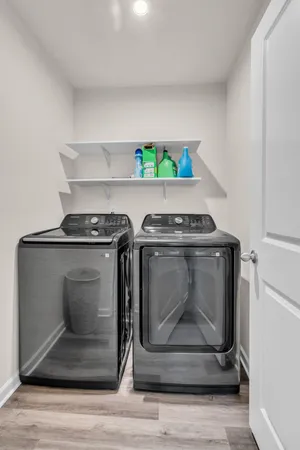 a stove top oven sitting inside of a kitchen