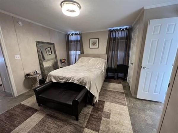 28 Grappone Drive Concord, NH 03301 - Photo 11 of 20 a bedroom with a bed and wooden floor