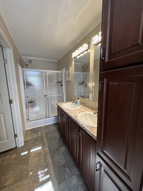 28 Grappone Drive Concord, NH 03301 - Photo 15 of 20 a bathroom with granite countertop shower and a sink