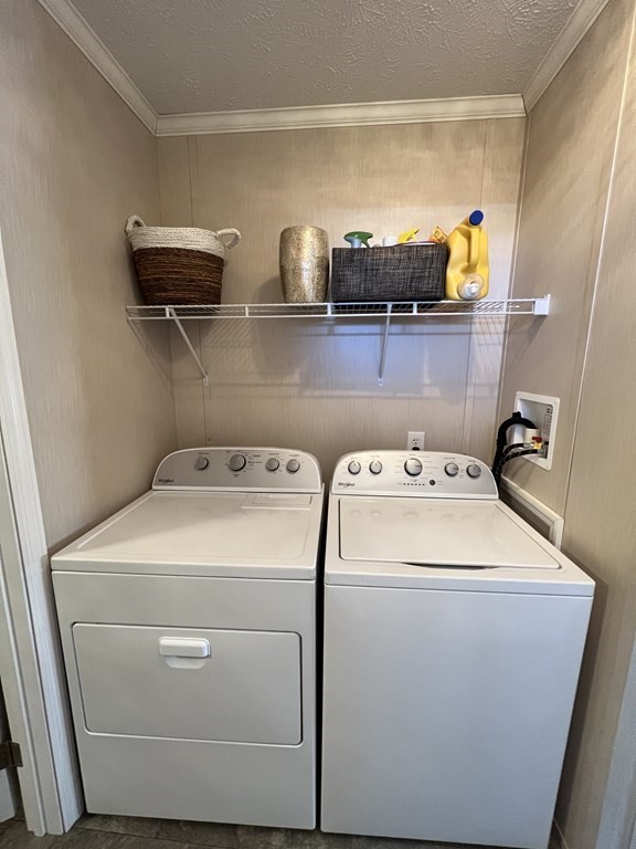 28 Grappone Drive Concord, NH 03301 - Photo 20 of 20 a utility room with dryer and washer