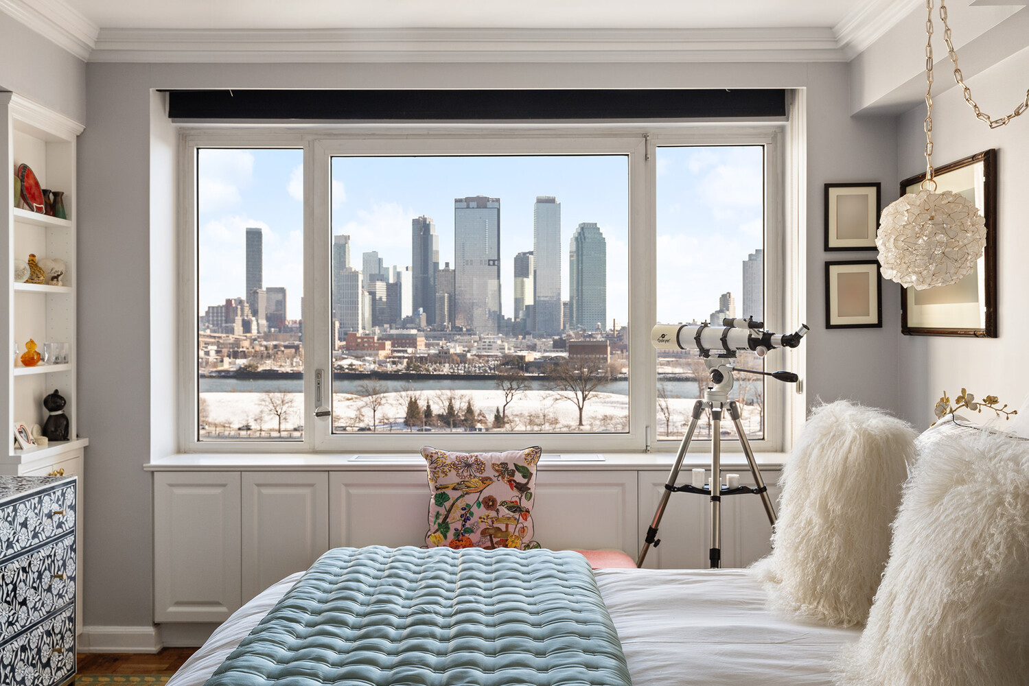 45 Sutton Place South, Unit 10H Manhattan, NY 10022 - Photo 12 of 18 a kitchen with a window a sink and a counter space