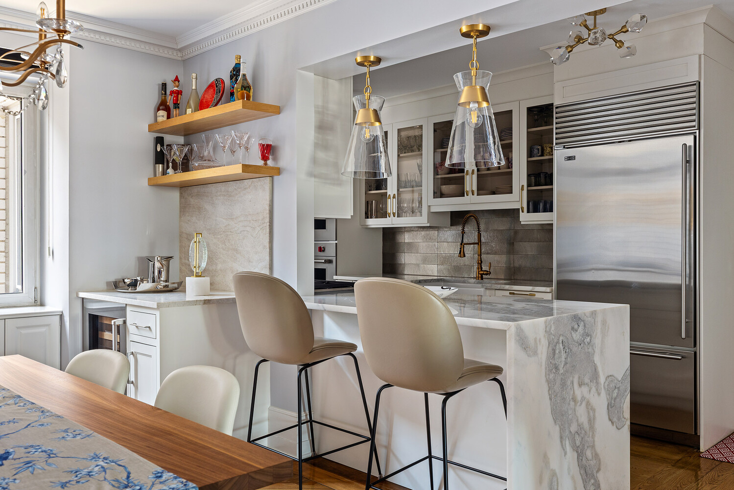 45 Sutton Place South, Unit 10H Manhattan, NY 10022 - Photo 6 of 18 a dining room with furniture and a window