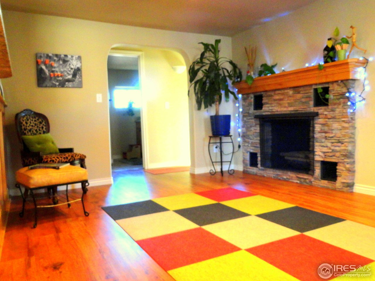 8171 Hygiene Road Longmont, CO 80503 - Photo 14 of 25 Cozy Fireplace off of Kitchen