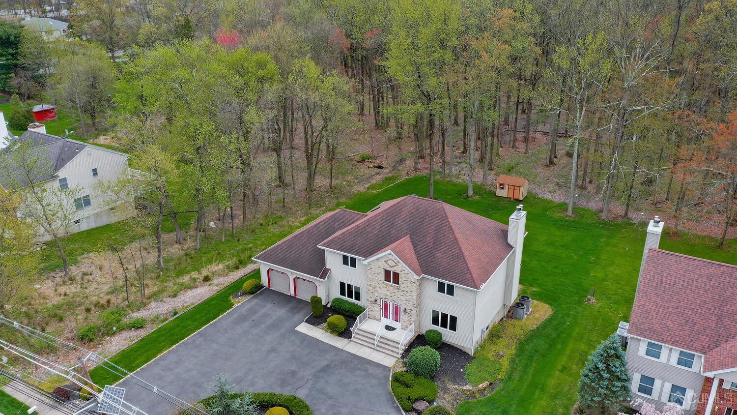 861 New Dover Road Edison, NJ 08820 - Photo 3 of 53 an aerial view of a house with garden space and street view