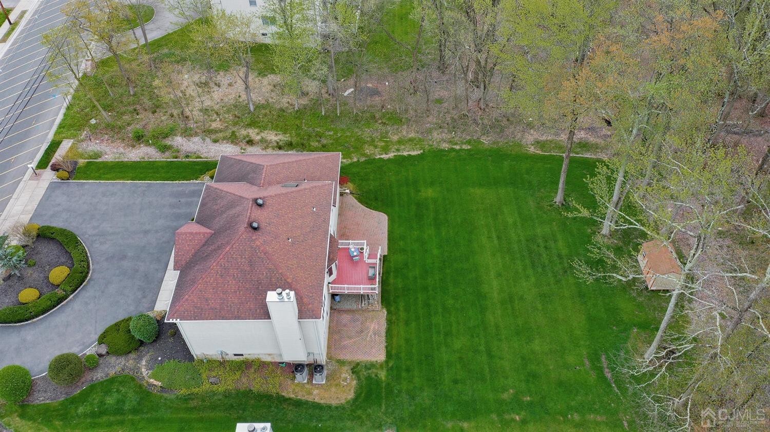 861 New Dover Road Edison, NJ 08820 - Photo 44 of 53 an aerial view of a house with a garden and trees