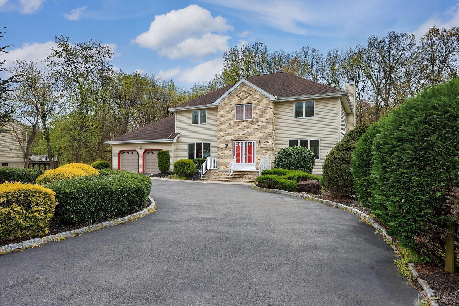 861 New Dover Road Edison, NJ 08820 - Photo 46 of 53 a view of a white house with a big yard and large trees