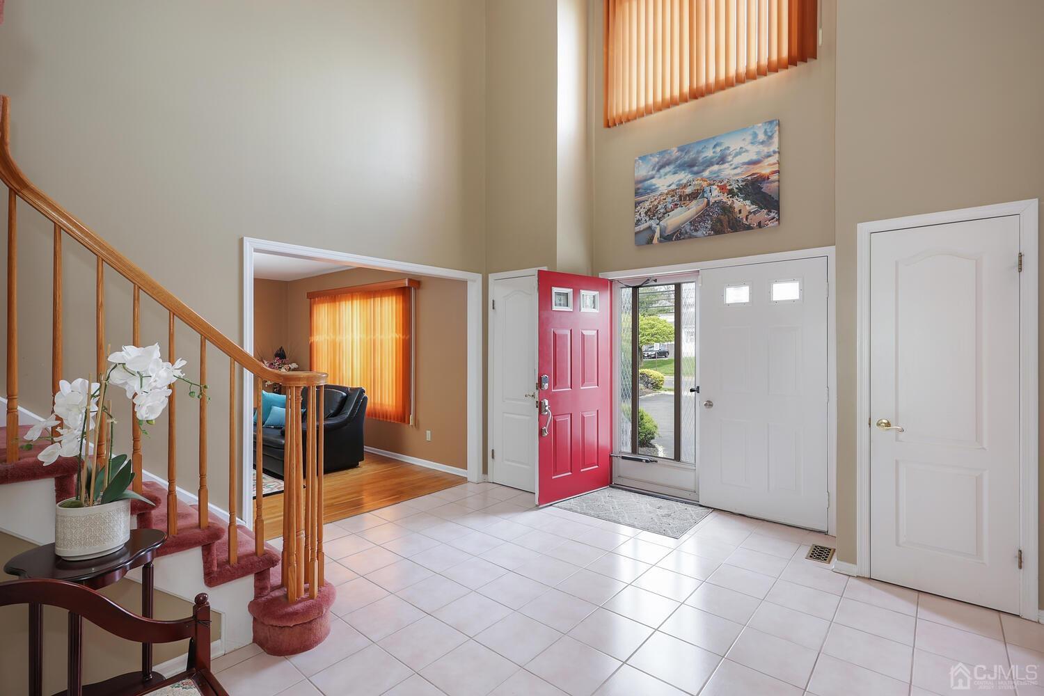 861 New Dover Road Edison, NJ 08820 - Photo 6 of 53 a view of an entryway with wooden floor