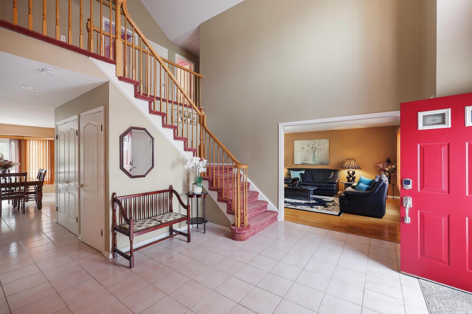 861 New Dover Road Edison, NJ 08820 - Photo 8 of 53 a bedroom with furniture and a chandelier
