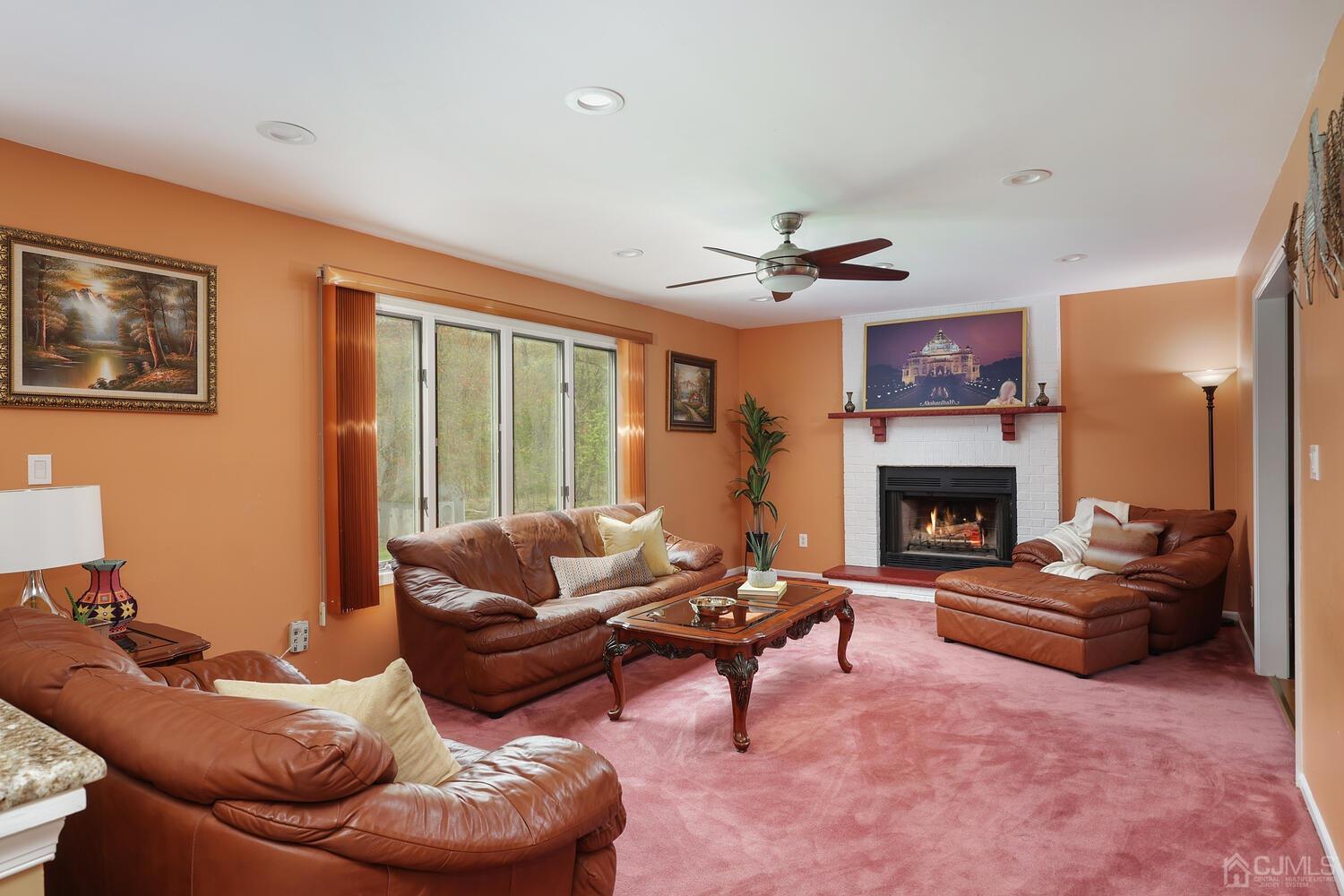 861 New Dover Road Edison, NJ 08820 - Photo 10 of 53 a living room with furniture and a fireplace