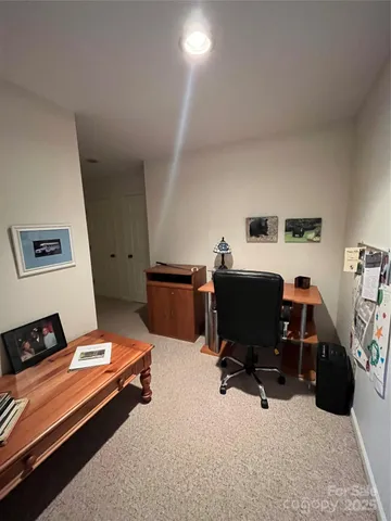 a room with furniture and a desk