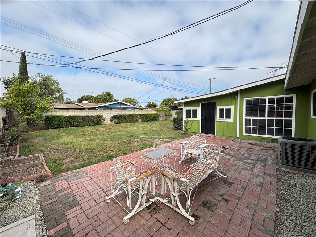 1022 Concord Street Santa Ana, CA 92701 - Photo 18 of 19 a view of a house with backyard and porch