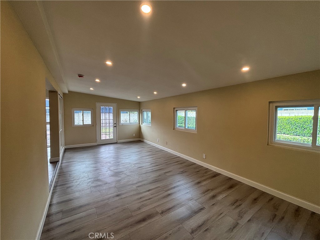 1022 Concord Street Santa Ana, CA 92701 - Photo 9 of 19 a view of a room window and wooden floor