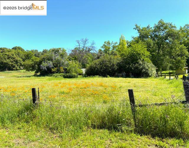18215 Aarondale Road Sonora, CA 95370 - Photo 18 of 39 a view of a swimming pool and a yard