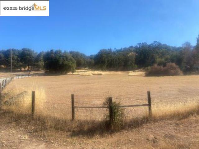 18215 Aarondale Road Sonora, CA 95370 - Photo 21 of 39 a view of a lake with a yard