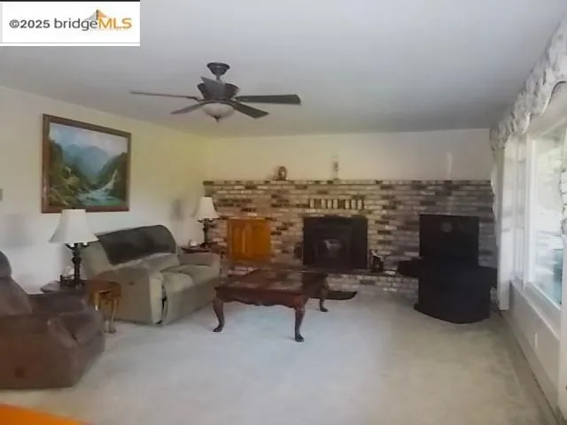 a view of a livingroom with furniture