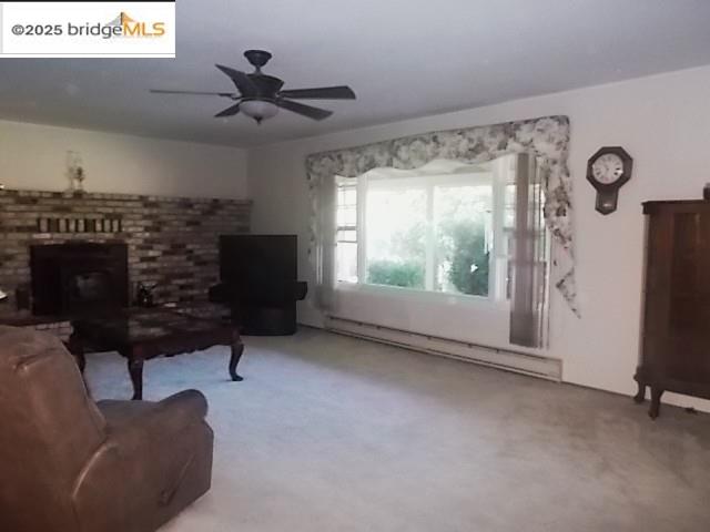 18215 Aarondale Road Sonora, CA 95370 - Photo 24 of 39 a living room with furniture and a fireplace