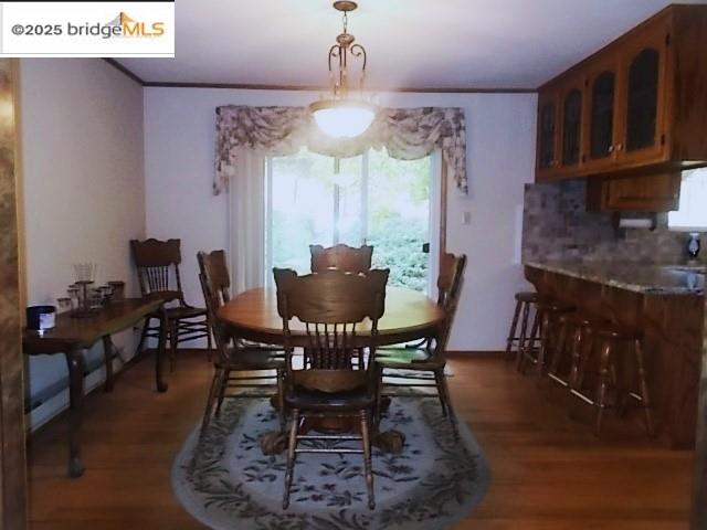 18215 Aarondale Road Sonora, CA 95370 - Photo 26 of 39 a view of a dining room with furniture and chandelier