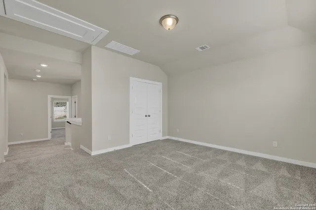a bathroom with a sink a vanity and a mirror