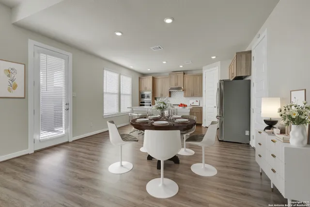 a view of kitchen with wooden floor