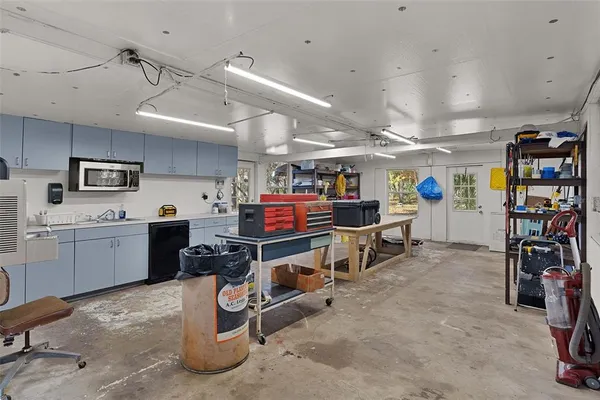 a bathroom with a sink toilet a mirror and vanity