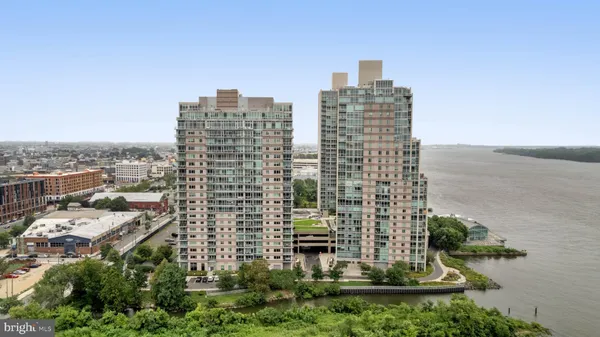 a view of a city with tall buildings in the background