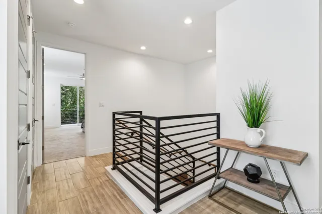 a bedroom with a bed and a chair