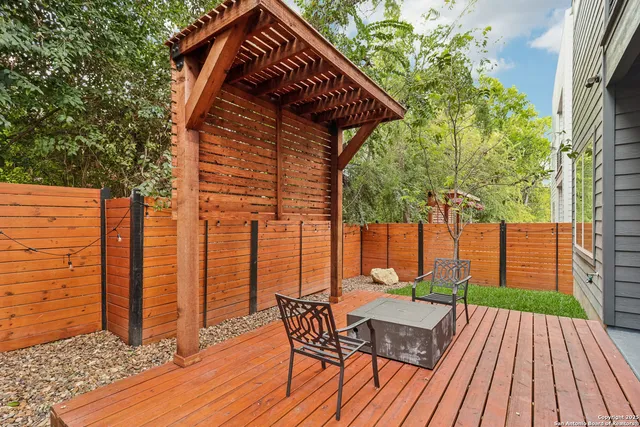 an aerial view of a house with a garden
