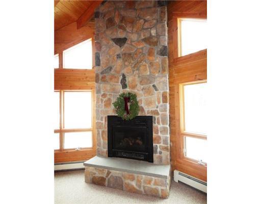 52 Moose Run Road Wayne, ME 04284 - Photo 7 of 9 Living Room. Fieldstone Fireplace